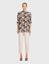 Villa Overshirt in Bayleaf, featuring a relaxed fit, stand collar, and short dolman sleeves, crafted from soft silk crepe.