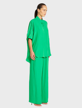 Elegant green silk pajama set featured, emphasizing its rich color and luxurious feel.
