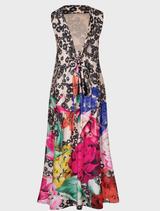 Feminine Bow Stopper dress with vintage floral print, dip-back design, and gathered hem for a comfortable, relaxed fit.
