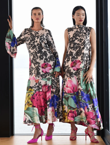 Vintage floral Bow Stopper dress with a dip-back, tie detail, and gathered hem for a relaxed, feminine silhouette.