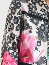Romantic Sheer As Day shirt with scattered daisies design, featuring ties, a button placket, and polished deep cuffs.