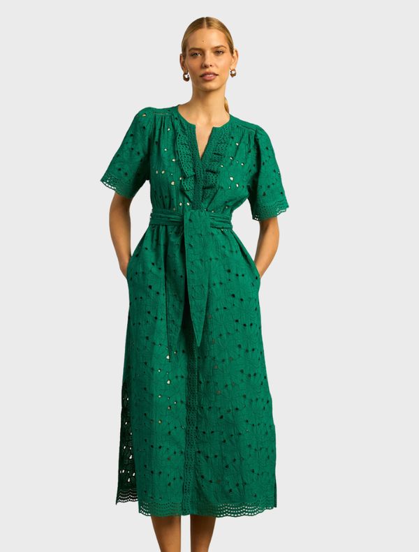 Elegant emerald green Voyage Dress with a flowing silhouette, perfect for formal occasions or evening events.