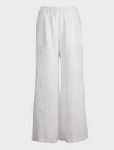 Close-up of white Walk And Talk Trousers, emphasizing the fabric texture and tailored cut for a polished appearance.