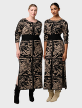 Merino wool blend dress with a floral design, showcasing a colorful flora deco pattern, perfect for stylish outings.