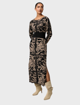 Stylish merino wool blend dress featuring a floral knit design, highlighted by a beautiful flora deco pattern.