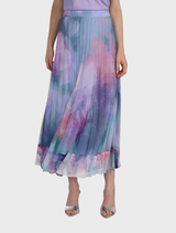Watercolour pleated skirt in aqua and lilac hues, showcasing a flowing design and vibrant color blend.