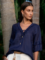 Elegant ramie blouse in indigo with a deep V neck, elasticated cuffs, side splits, and artisanal detailing at the seams.