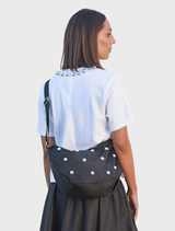 White T-shirt with a unique dome at the mouth design, ideal for relaxed, stylish looks.