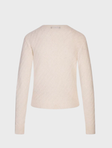 A neatly folded white cardigan, highlighting its lightweight material and casual style.