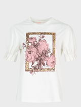 Stylish white T-shirt with foil accents, embodying the Foil & Flourish aesthetic.