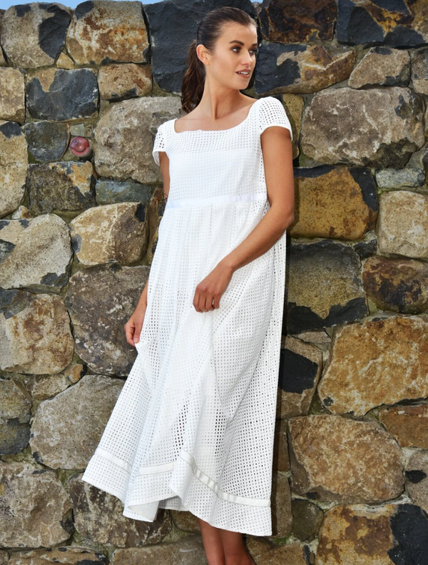 Swing Of Beauty dress in white, showcasing a graceful silhouette perfect for formal events or casual outings.