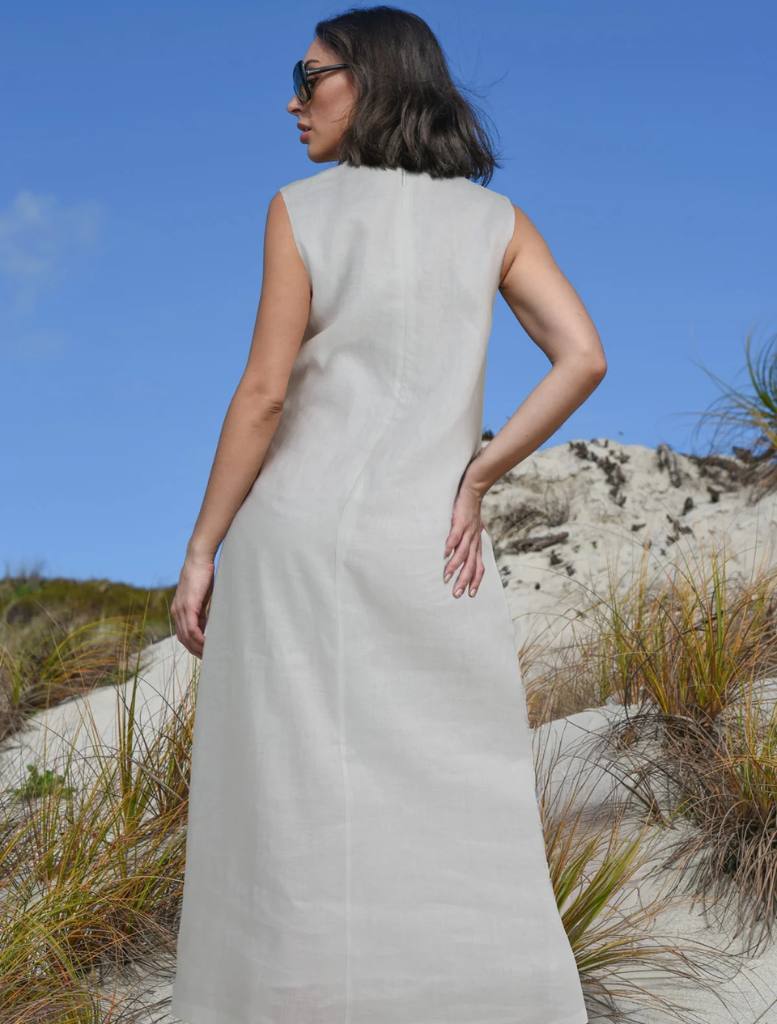 Elegant white Trump Card Dress with a fitted silhouette, ideal for special events and sophisticated gatherings.