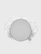 Elegant white pillbox hat with structured design and veiling, perfect for formal events and race day attire.