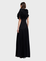 A stylish black Whittington gown on display, featuring a classic design with a flattering fit and graceful lines.