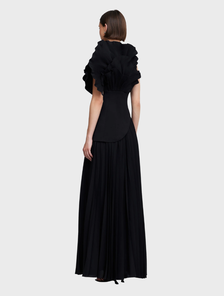 A stylish black Whittington gown on display, featuring a classic design with a flattering fit and graceful lines.