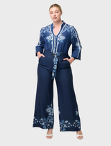 Cropped straight leg pants made of stonewashed blue leather, offering a fashionable and sleek silhouette.
