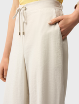 Full-length trousers in moonstone, designed with wide legs for comfort and a chic appearance in any wardrobe.