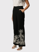 Stylish black wide-leg pant crafted from linen-viscose, featuring front embroidery and an elasticated waistband for comfort.