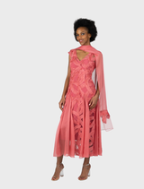 Willow V-neck cocktail dress in a delicate blossom shade, featuring a flared godet design for added elegance.