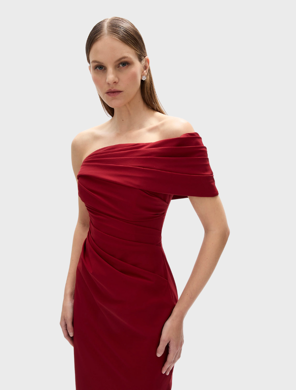 The Gale gown in rich wine hue features a graceful design, ideal for evening events and special celebrations.
