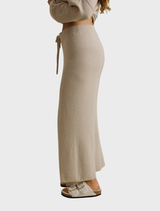 Cozy Winter Retreat Merino Cotton Pant in a warm wheat hue, ideal for layering in cold weather settings.