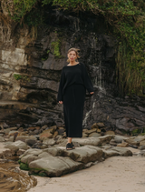 Winter Retreat Merino Cotton Skirt in Noir, featuring a sleek design suitable for cold weather styling.