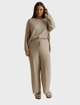 Wheat-colored Winter Retreat Merino Cotton Pant, designed for warmth and comfort during winter retreats.