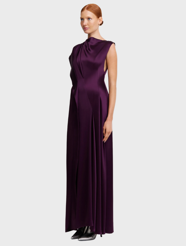Elegant sleeveless silk dress by The Row, featuring a minimalist design and luxurious texture.