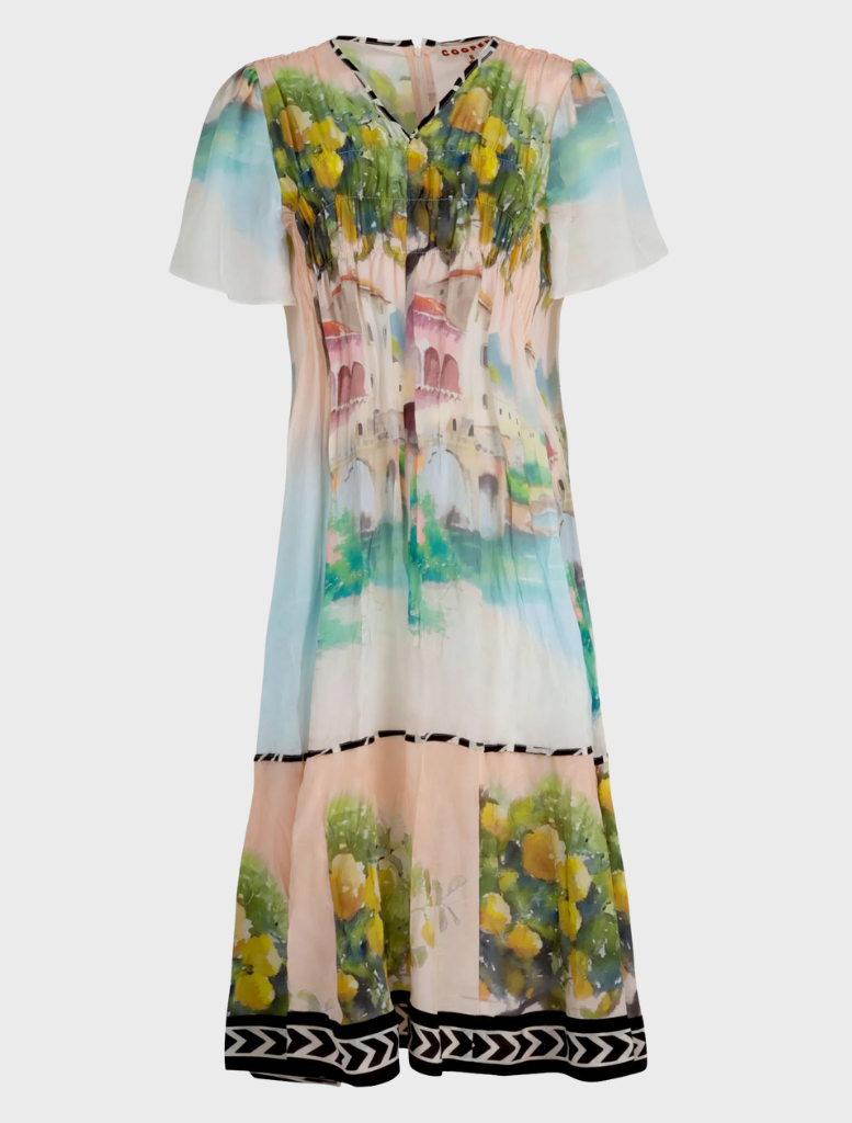 Fashion-forward pink dress with an artistic paint motif, designed to stand out at formal and casual occasions alike.