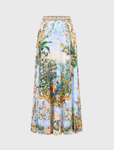 Luxurious silk maxi skirt showcasing a lilac landscape print, designed for movement, with crystal accents and an invisible zip.