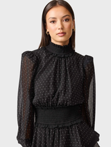 Stylish black Moss Mini Dress with a minimalist design, offering versatility for both casual and formal settings.