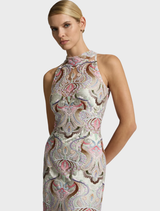 Soft sorbet-nude sleeveless Paloma top, perfect for layering or wearing alone in casual summer settings.