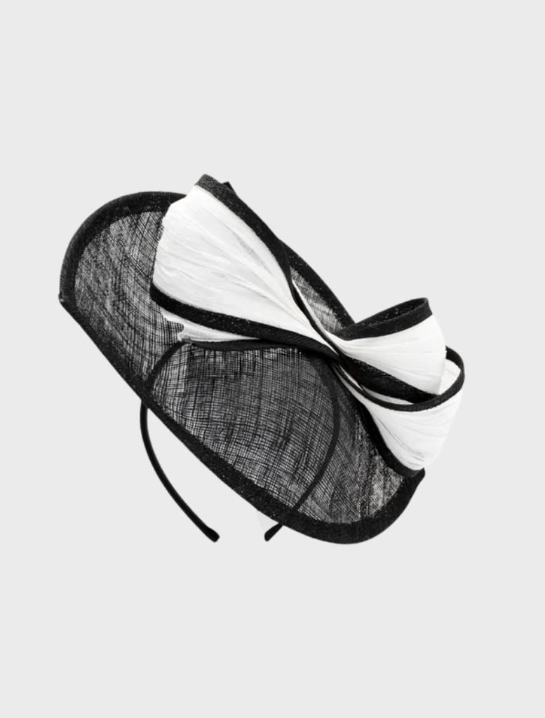 Striking black and white Xanthia fascinator with artistic details, designed to complement elegant ensembles at special events.