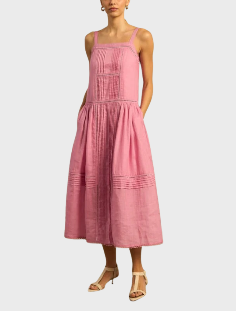 Elegant Altitude Dress in Floss hue, designed with a flattering silhouette for sophisticated gatherings.