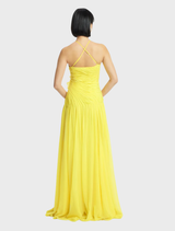 Amya Floral Applique Gown in Sunshine features a square neckline, ruched bodice with 3D petals, and criss-cross back.