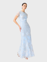 Annabelle's blue cap sleeve gown, characterized by its elegant style and perfect fit for upscale events.