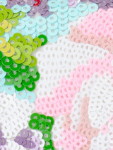 Close-up of the aqua floral sequin embellishment on the Audrey Sequin Top Handle bag