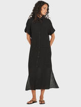 A black shirt dress made of linen, highlighting its simple yet stylish silhouette.