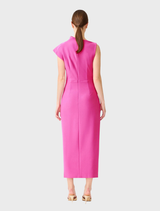 Close-up of a pink asymmetrical midi dress, emphasizing the fabric texture and design details.