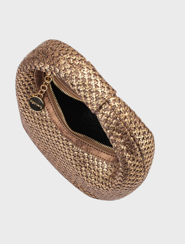 A bronze woven bag presented on a white background, illustrating its unique texture and fashionable look.