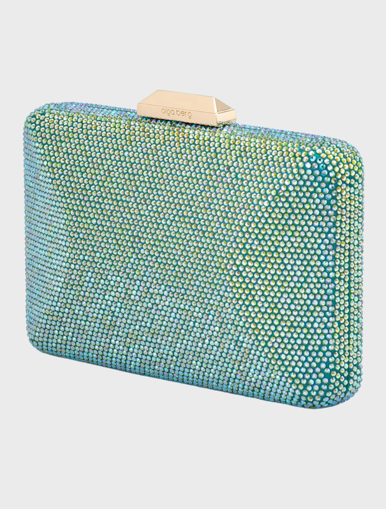 The Edith Iridescent Clutch - Green, a blue glitter bag, suspended from a stylish chain, showcasing its shimmering design.