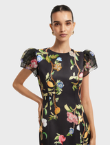 Chic maxi dress with puff sleeves, embellished and designed with a lemon vine print on a deep ebony fabric.