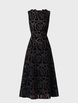 Chic black lace dress, perfect for evening outings, featuring delicate lace patterns and a sophisticated design.