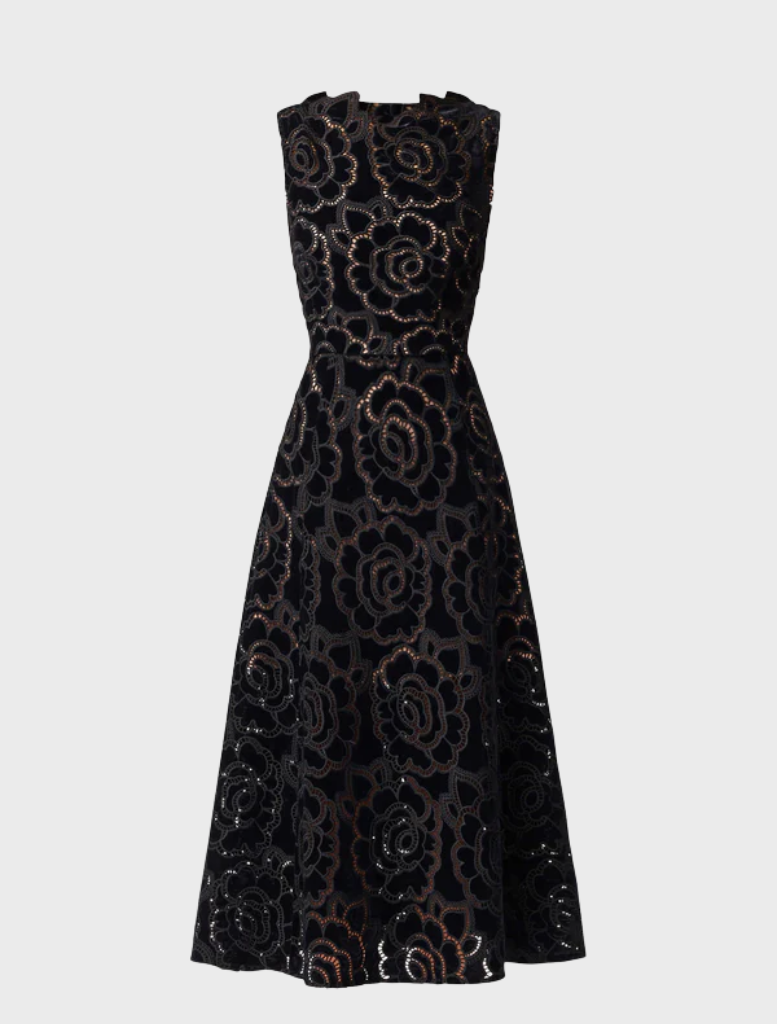 Chic black lace dress, perfect for evening outings, featuring delicate lace patterns and a sophisticated design.