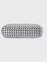 A modern silver clutch bag with a decorative chain design, ideal for enhancing evening looks or special events.