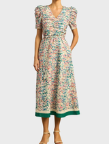 A stylish Glimmer Dress with a marble print, designed for a flattering fit and an eye-catching appearance.