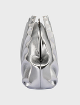 Elegant silver pleated clutch by Hollie, perfect for accessorizing formal wear or special occasions.