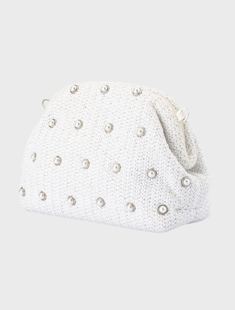 A trendy white clutch bag decorated with silver studs, suitable for various occasions.