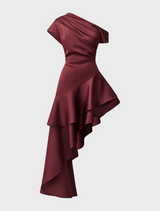 Satin burgundy dress with an asymmetric hem, combining sophistication and modern style in its design.