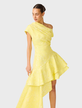 Elegant yellow gown with one shoulder design and ruffle accents, perfect for formal occasions.
